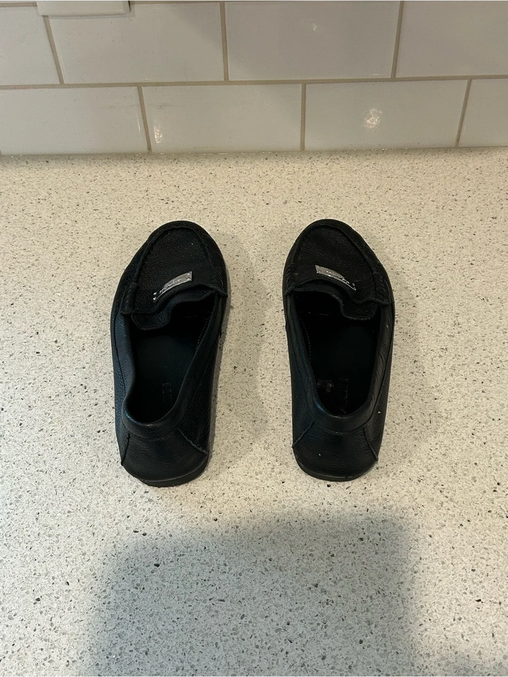 Coach sleek black